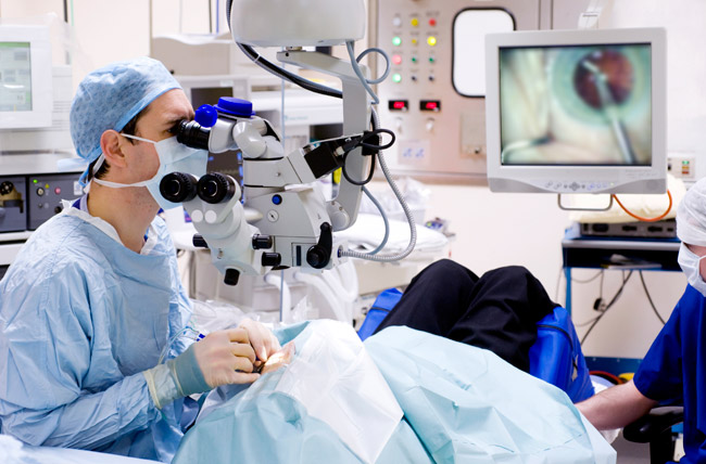 Ophthalmology doctors performing surgery